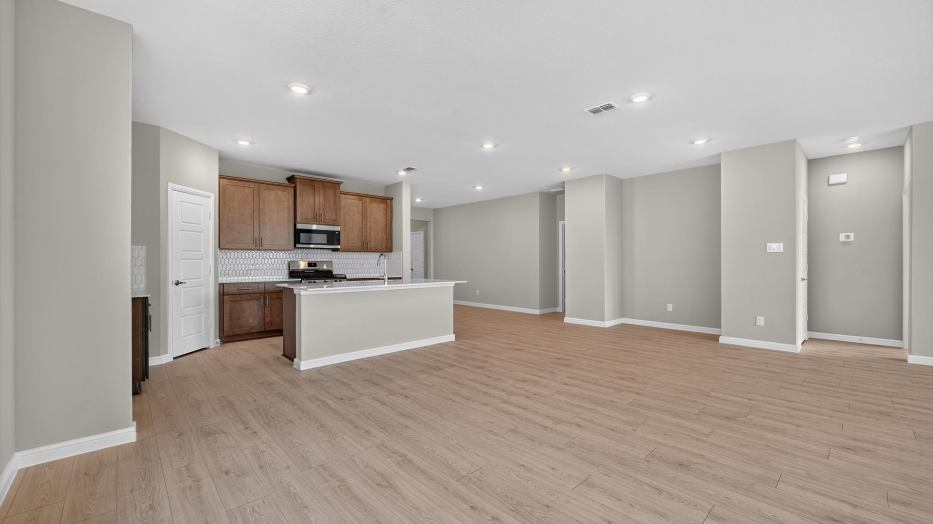 Kitchen, dining, and living