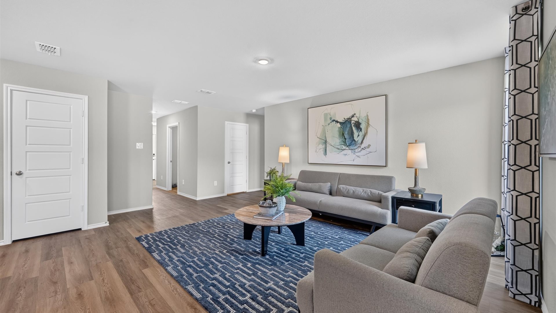Open concept living and hallway