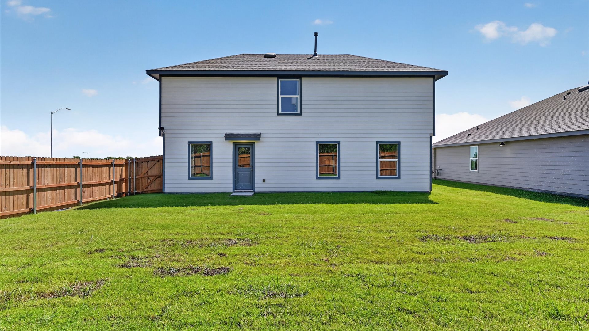 Rear of home overlooking backyard