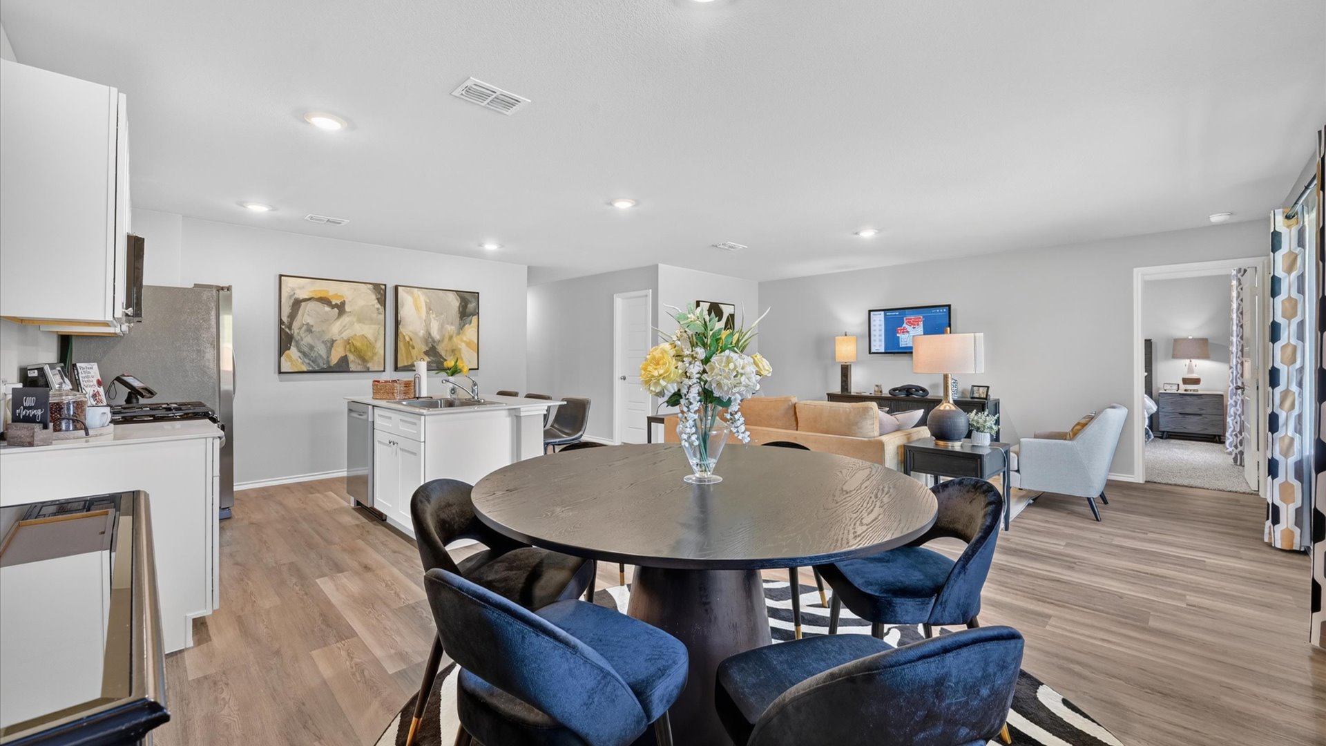 Dining area overlooking kitchen and living space