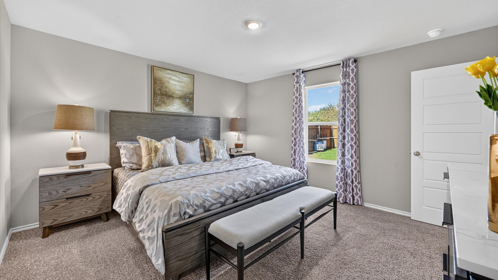 Primary bedroom with ample natural light
