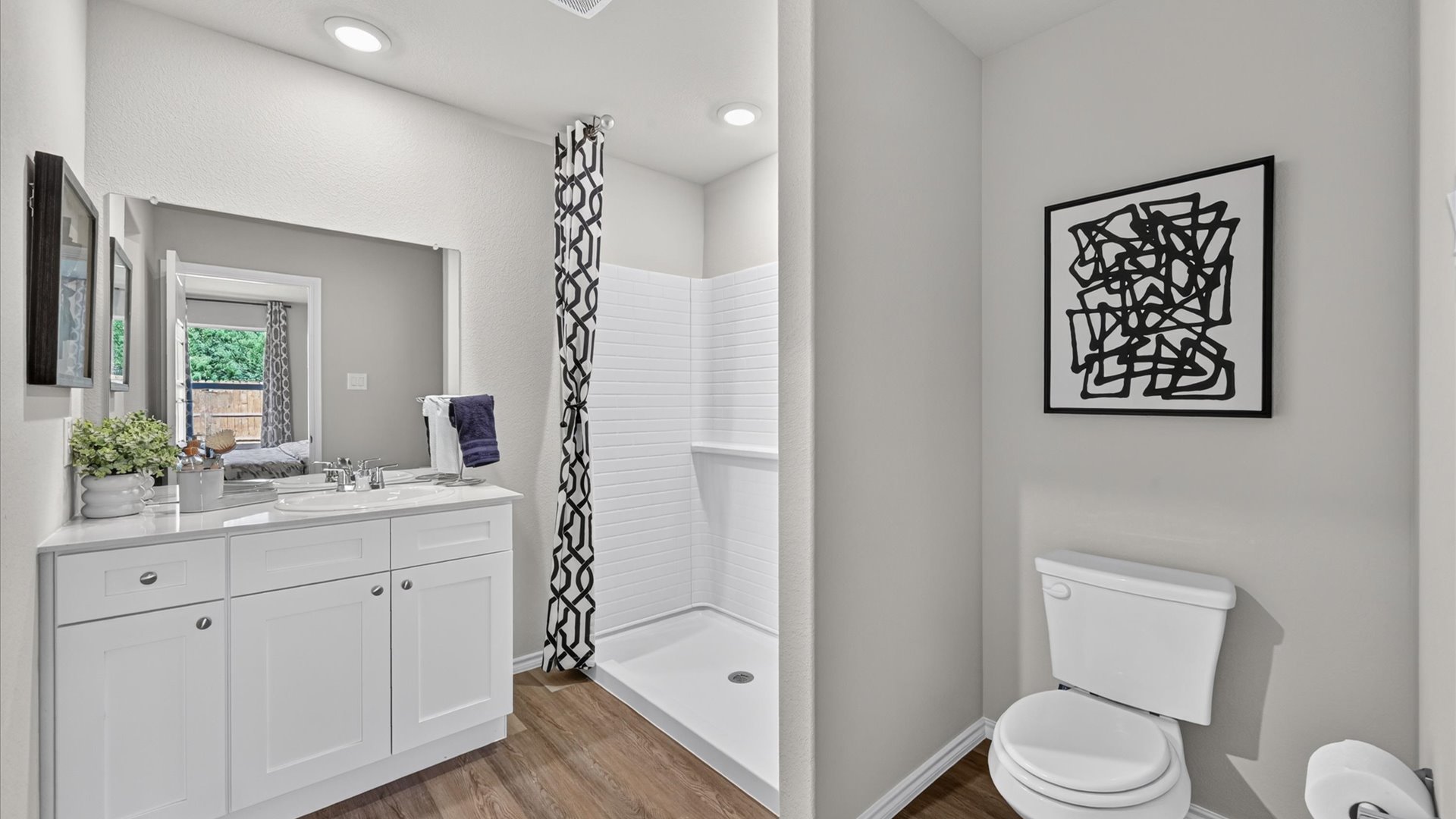 Bathroom 1 with luxurious vanity and shower
