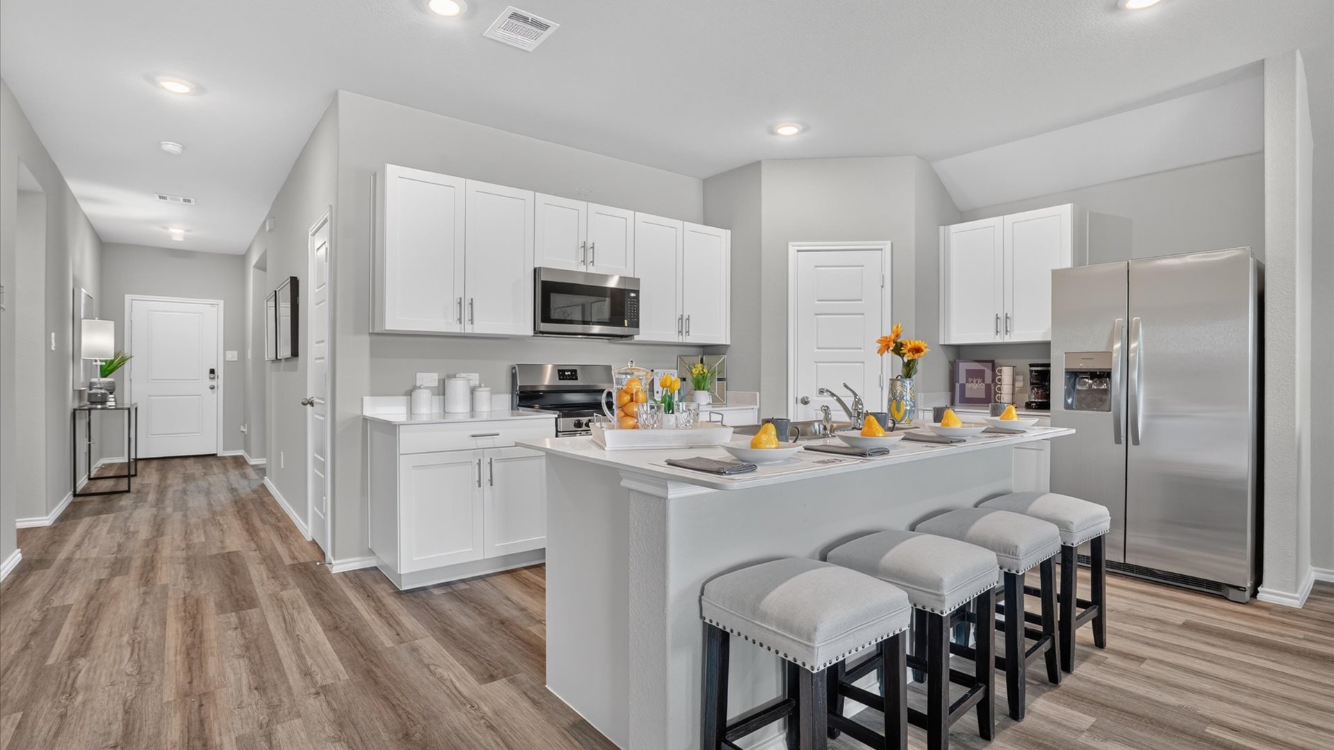 Open kitchen with spacious island and countertop space