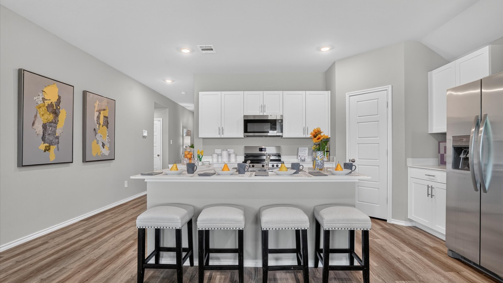 Open kitchen with island and seating area