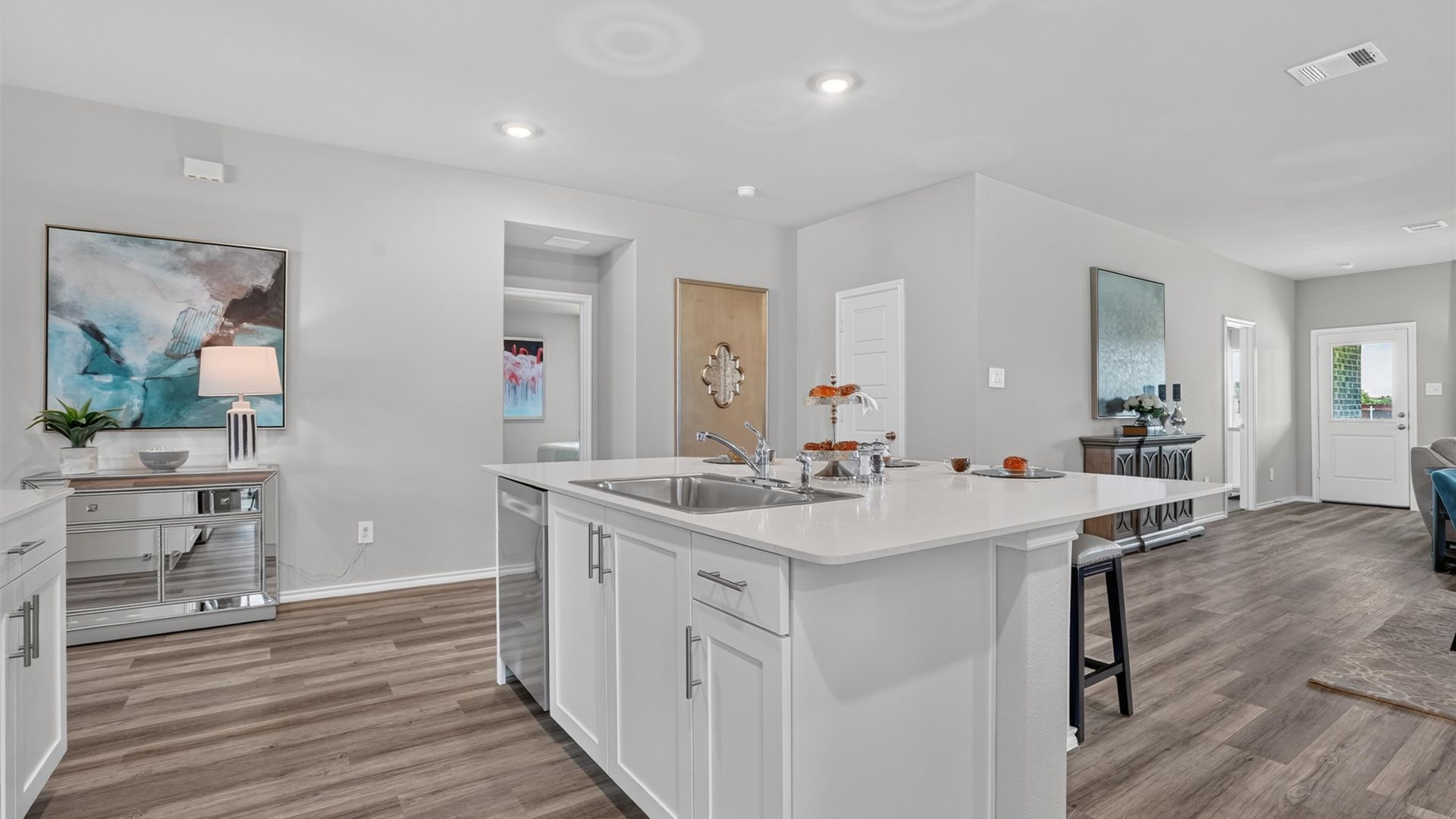 Kitchen island overlooking living and dining