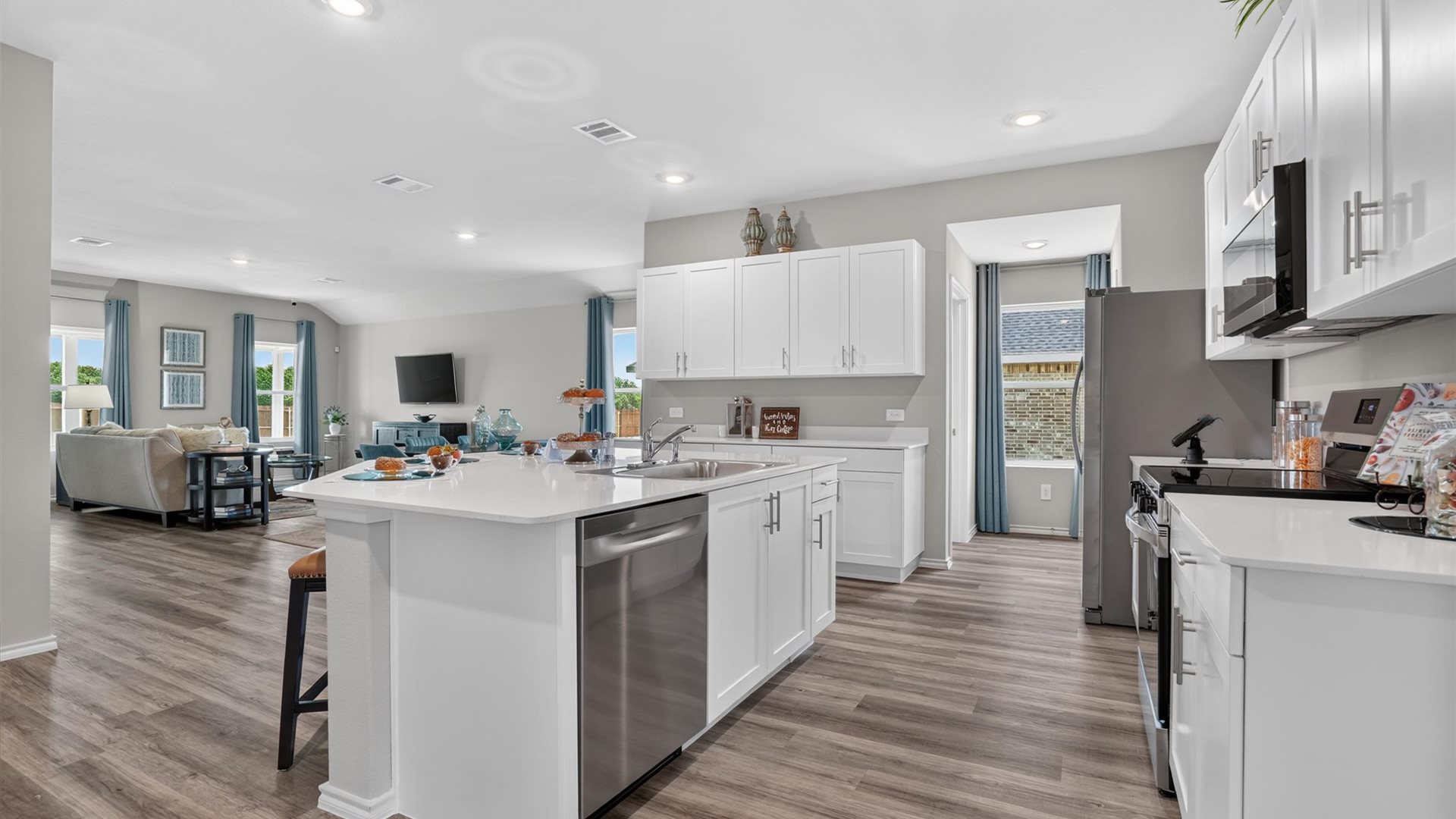 Kitchen island and stainless steel appliances