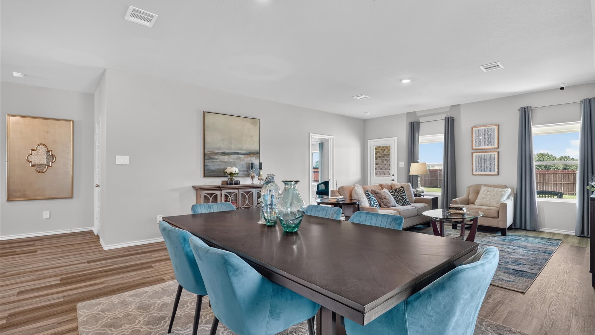 Open dining area next to kitchen overlooking living