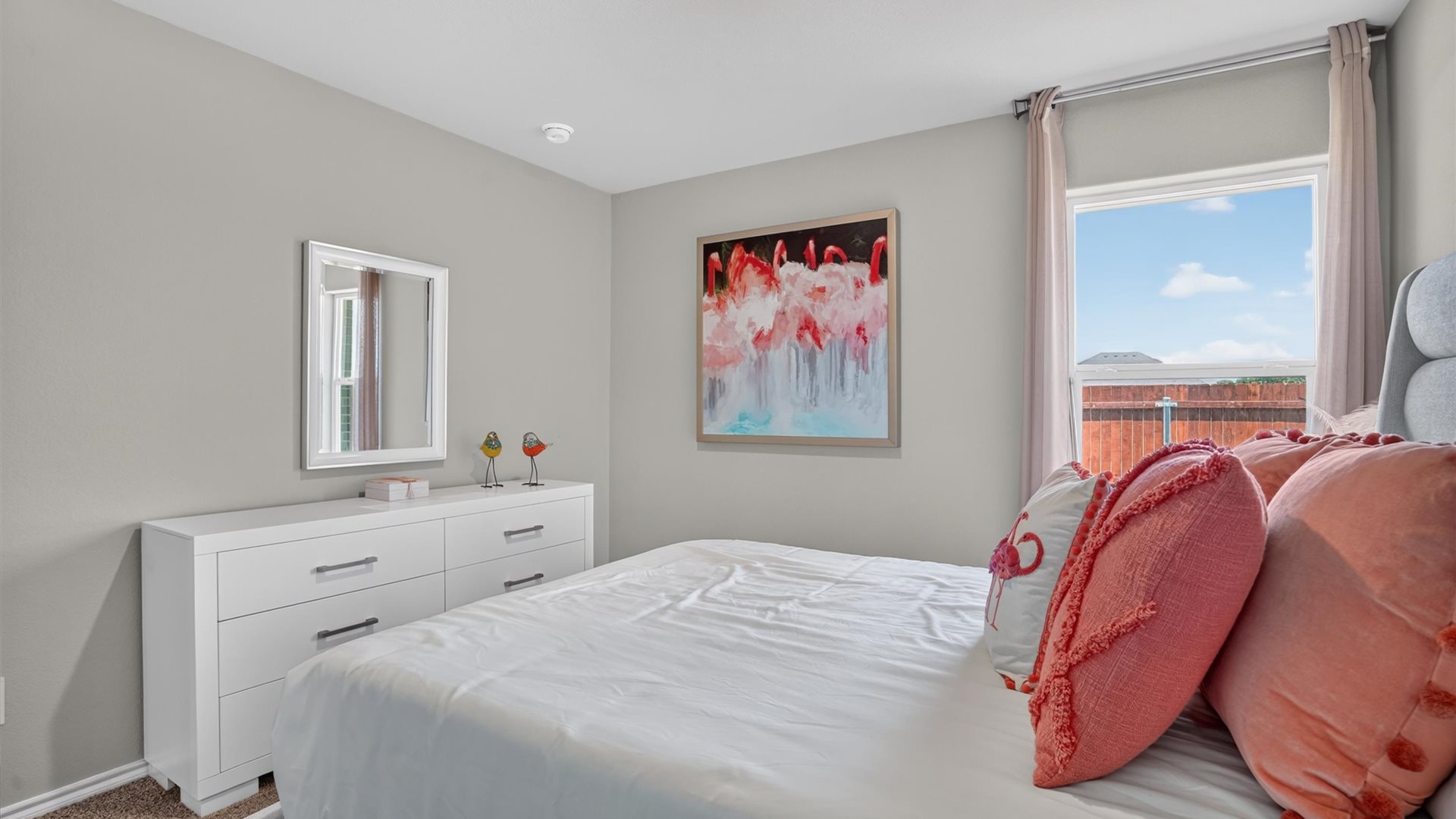 Bed 3 with natural light and plush carpet floors