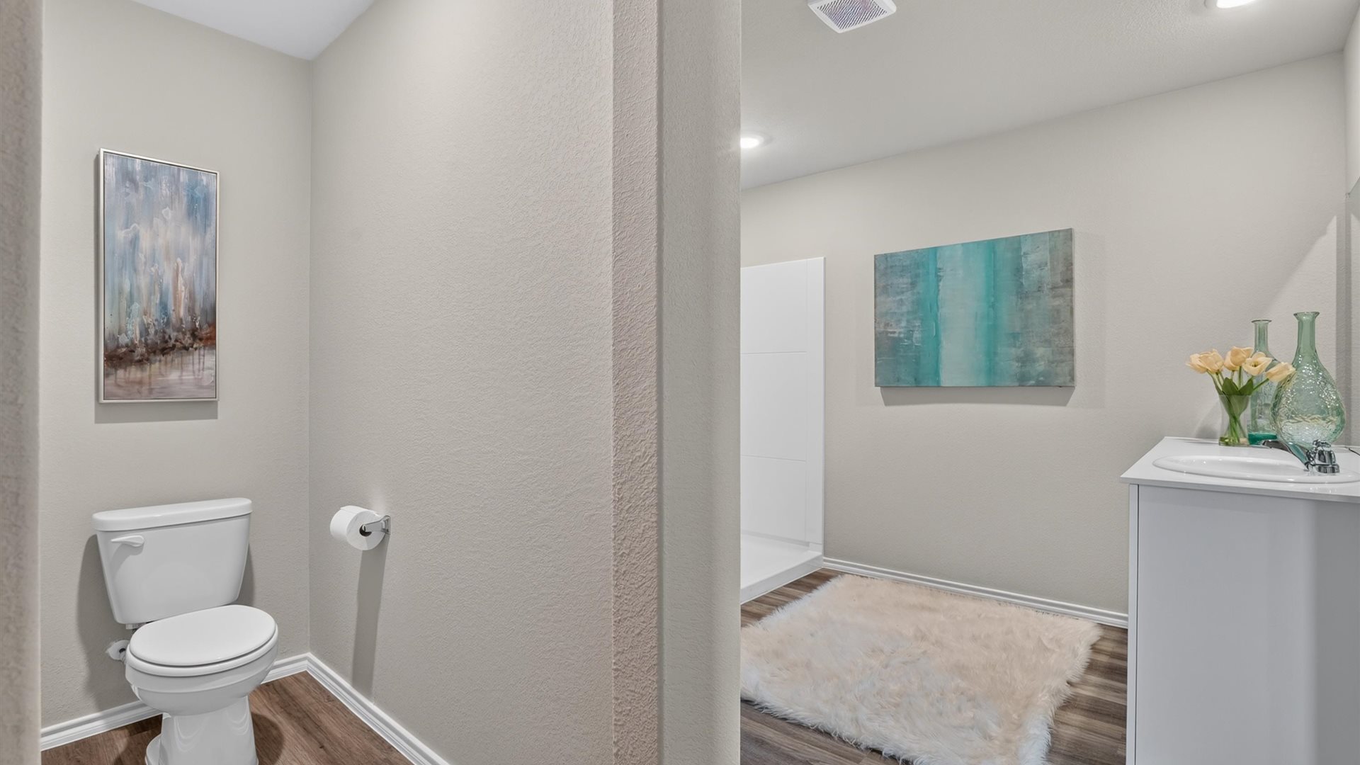Private ensuite bathroom 1 with water closet and walk-in closet