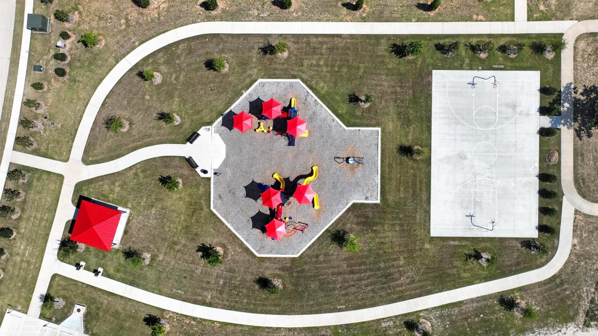 Saratoga community playground, basketball court, and walking path