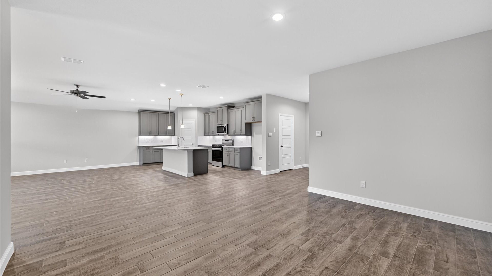 Kitchen, living, and dining space