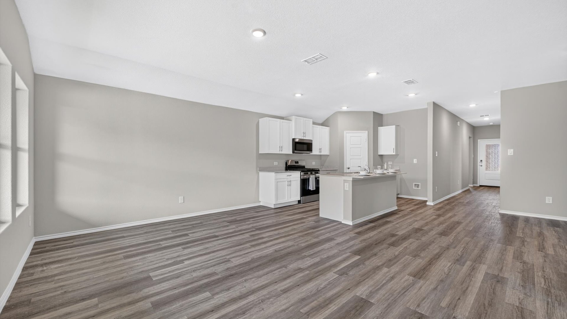 Open concept kitchen, living, dining