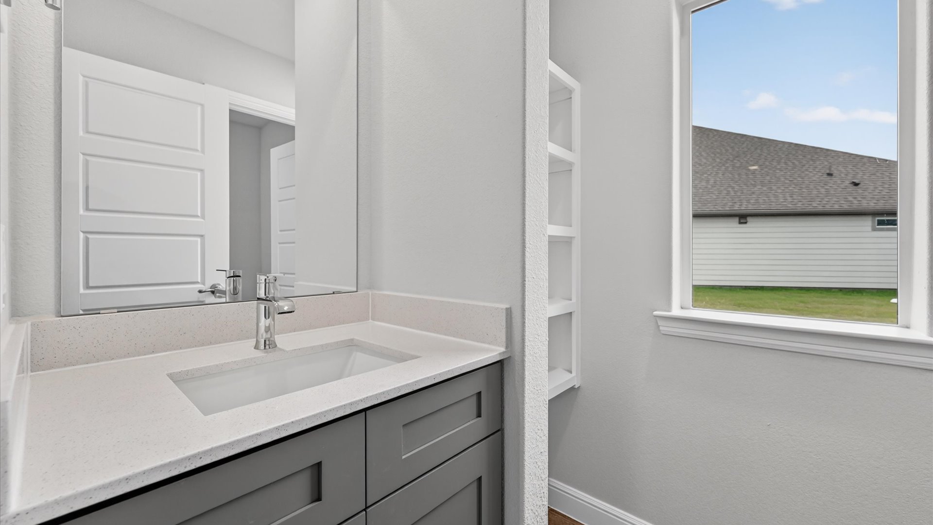 Bathroom 2 with built in vanity and shelving