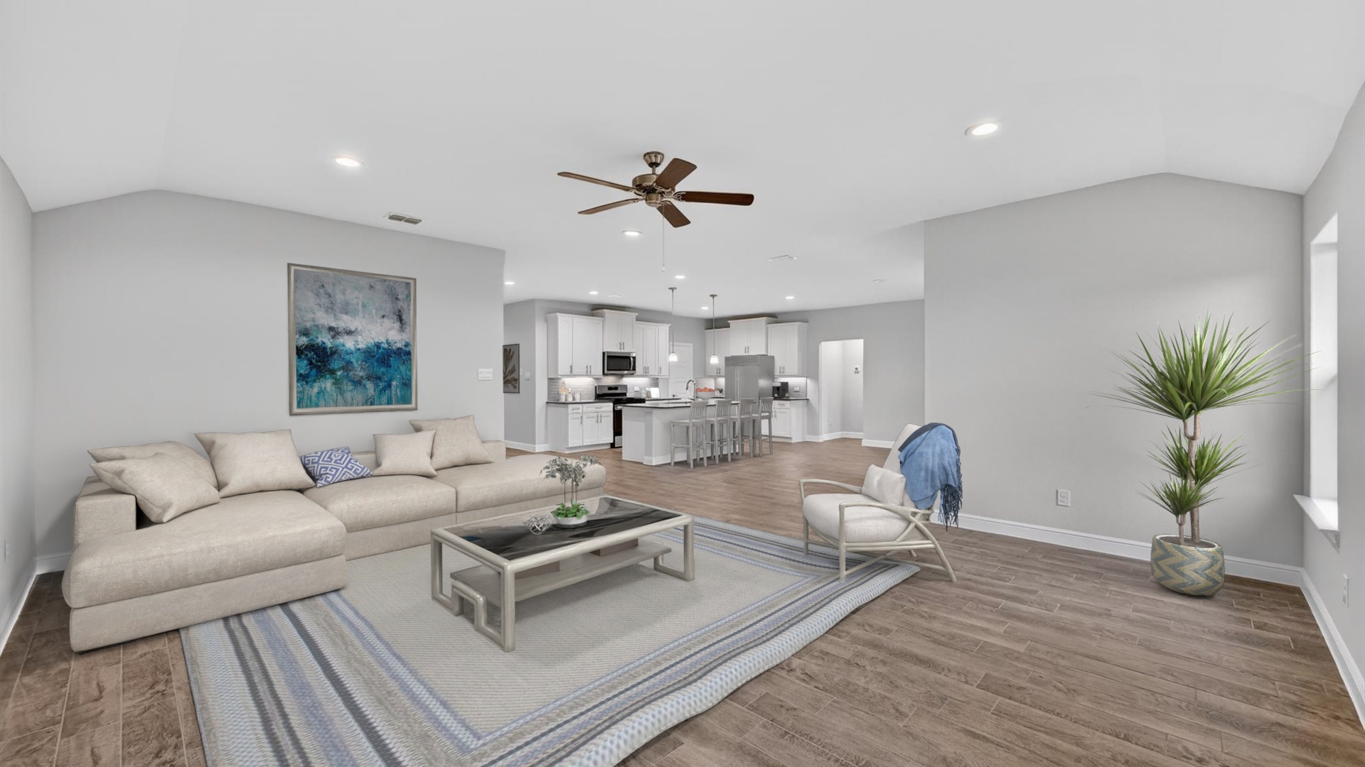 Open concept living/family, dining, and kitchen space