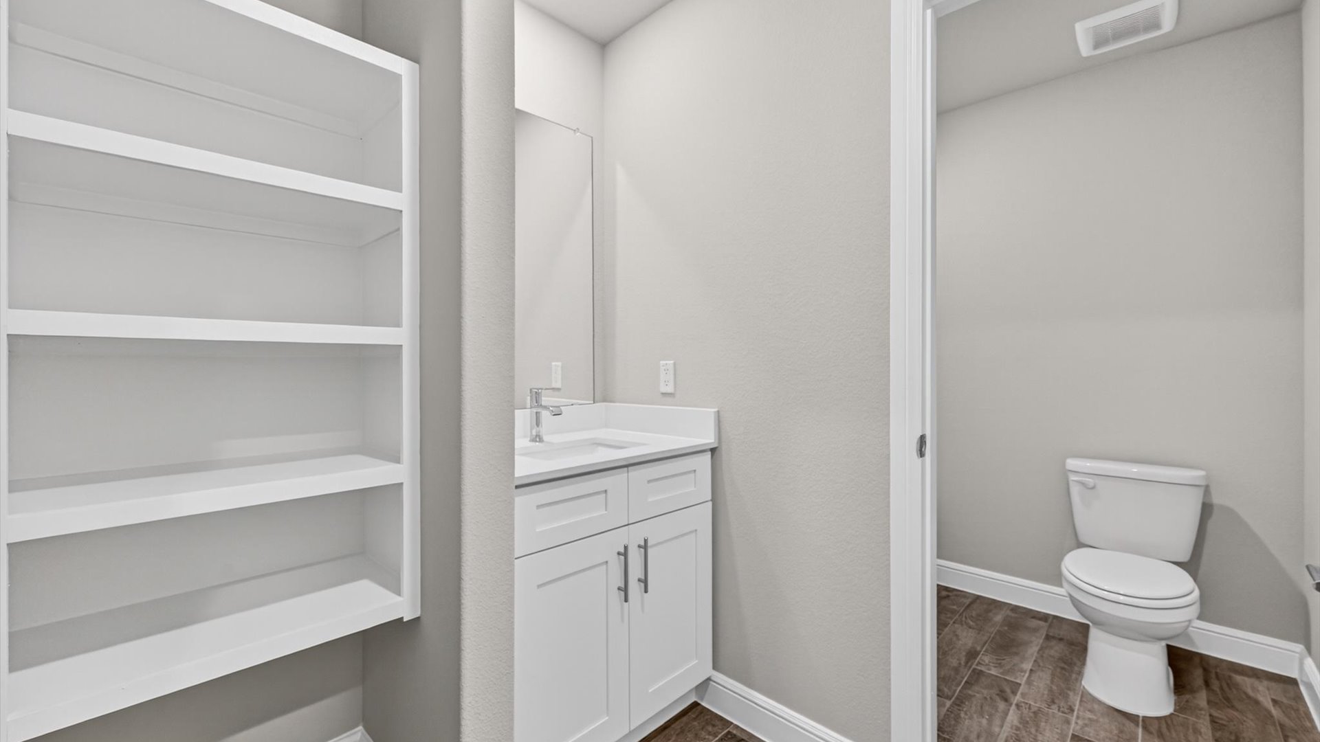 Bathroom 2 with built in vanity and storage space
