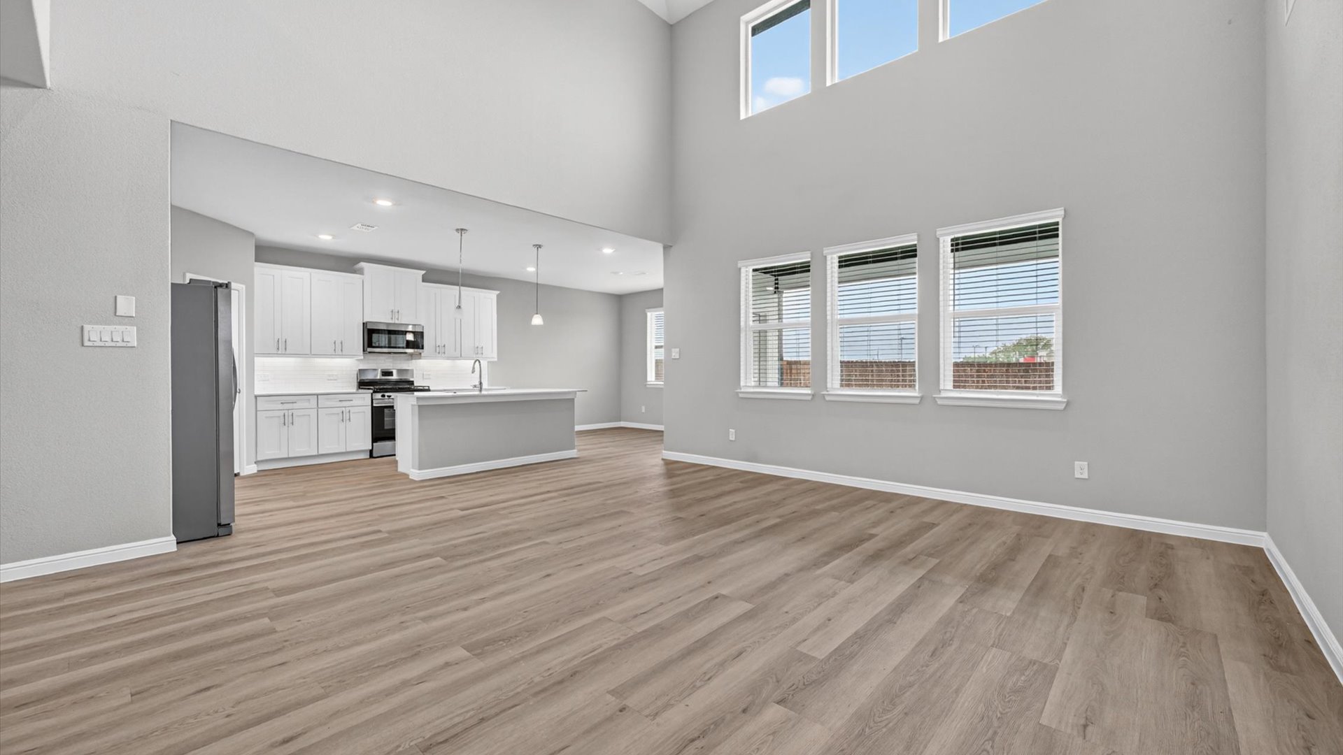Open concept kitchen, dining, and living space