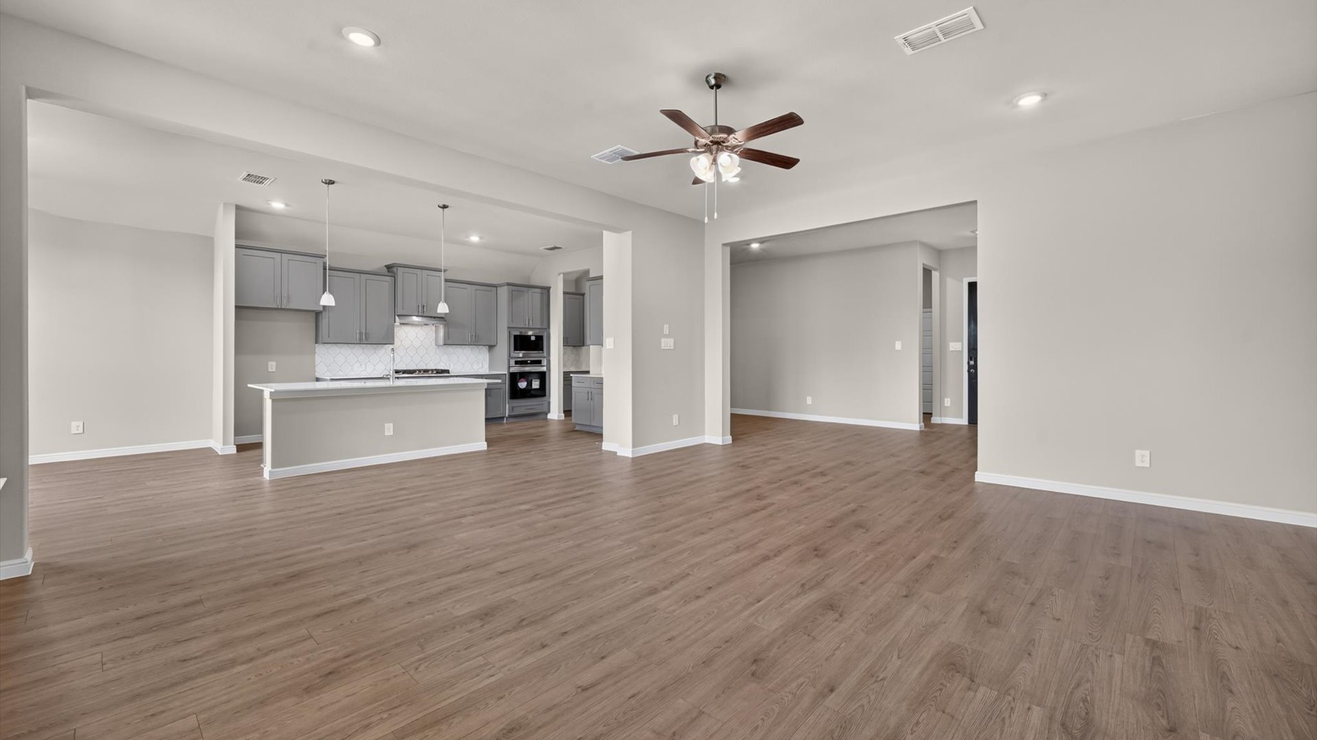 Open kitchen, dining, and living area