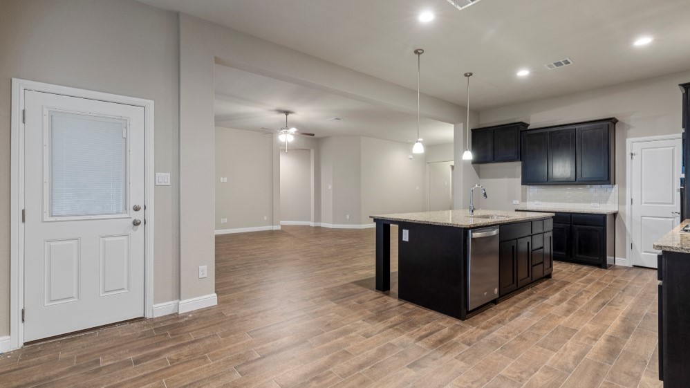 Open-concept kitchen and dining