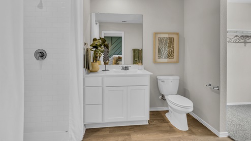 Main bathroom with sink and toilet.