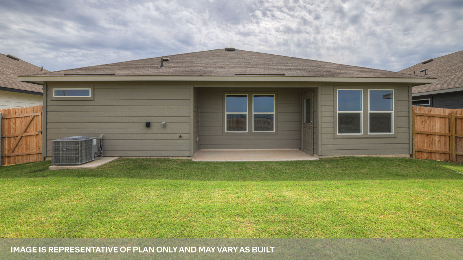 Covered patio with fully sodded backyard.