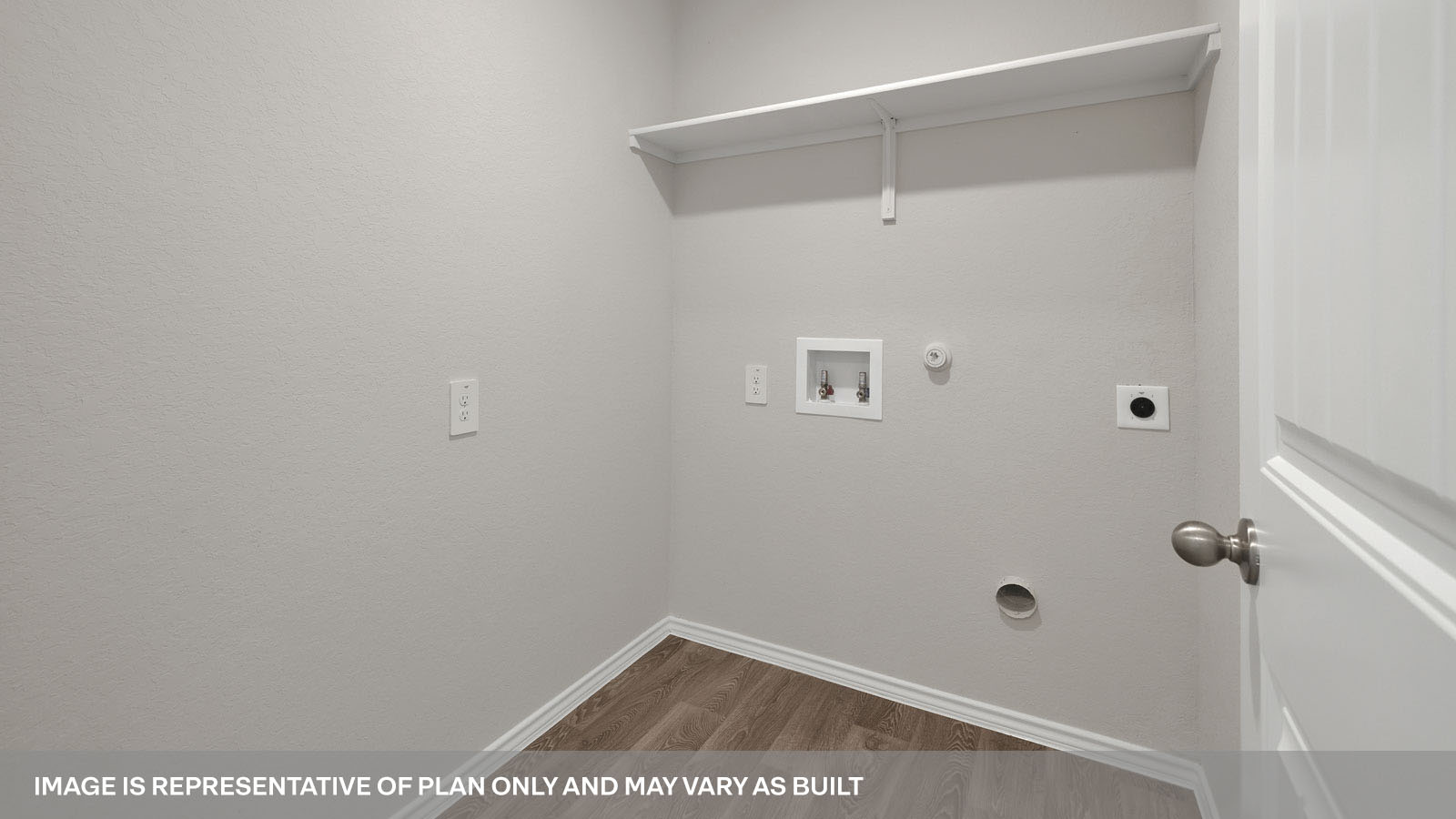 Laundry room with washer/dryer connections and wooden shelving.