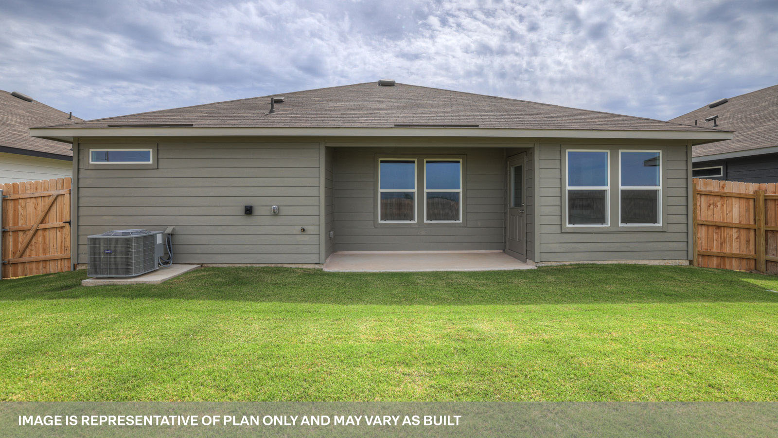 Covered patio with 2 windows and fully sodded backyard.