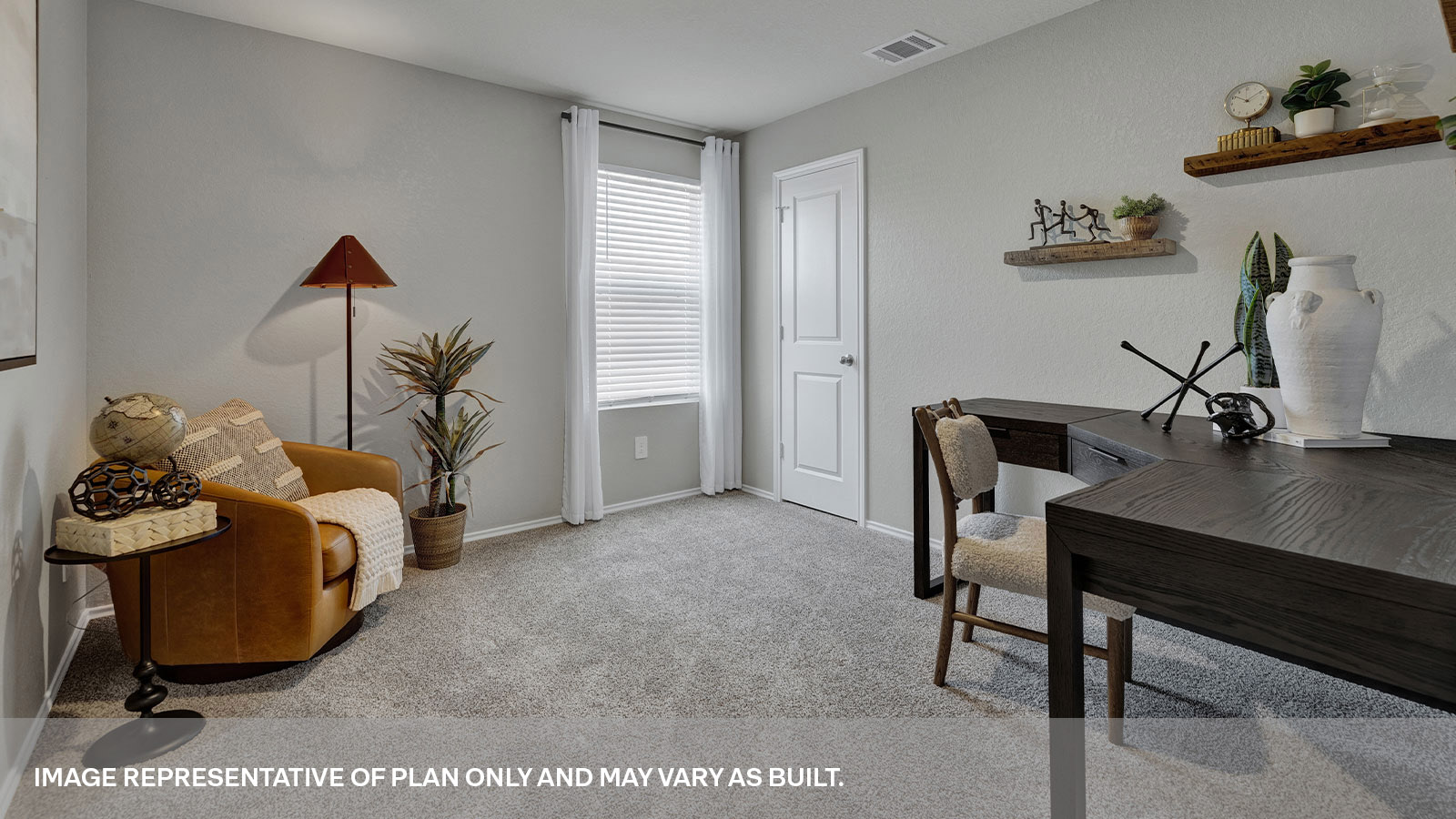 Bedroom with carpeting and one window.