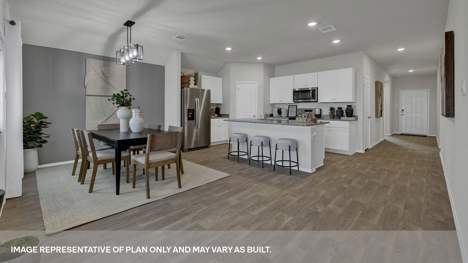 Dining room with opening to the kitchen with entry hallway.
