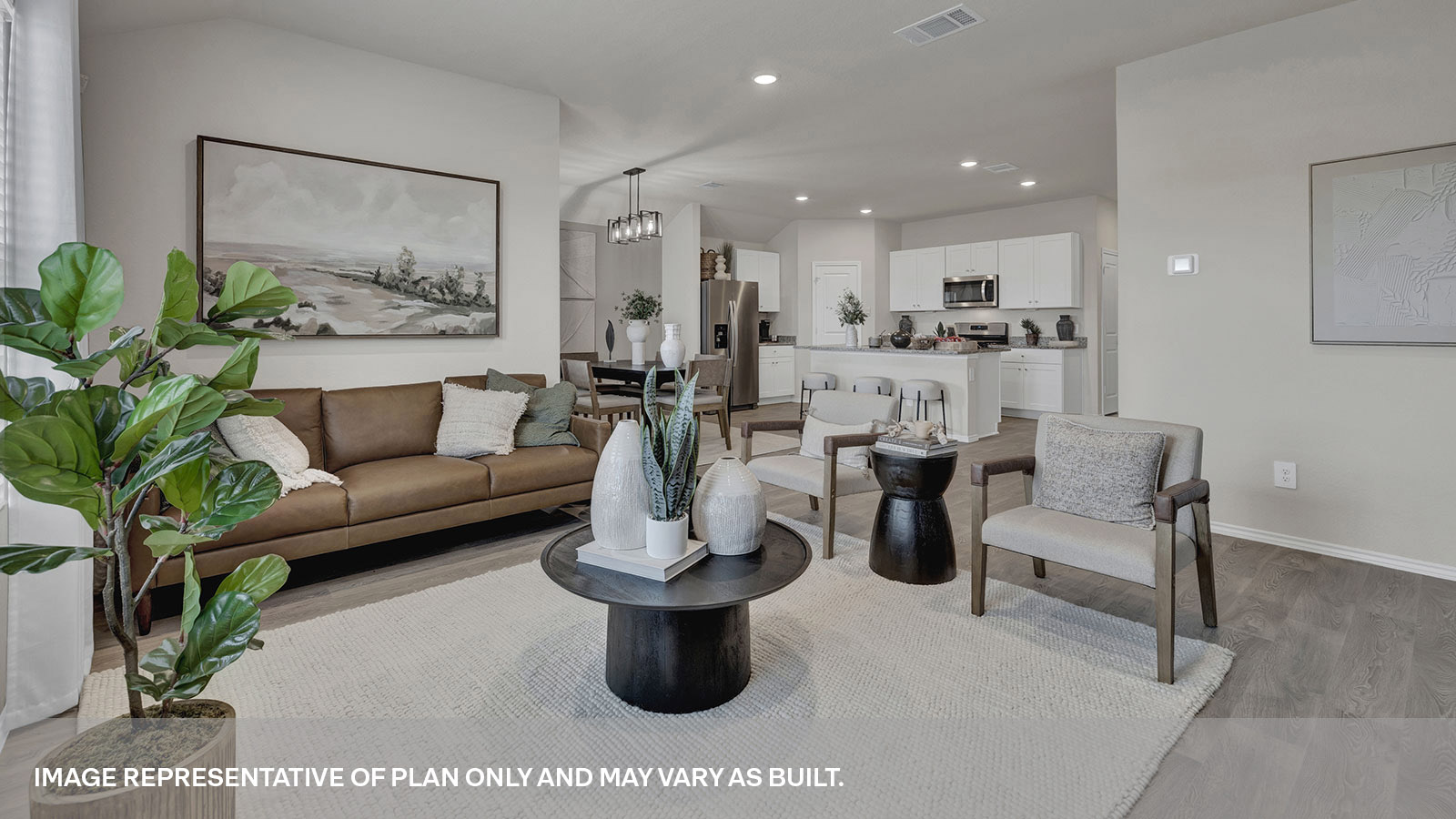 Living room opening to the dining room and kitchen.