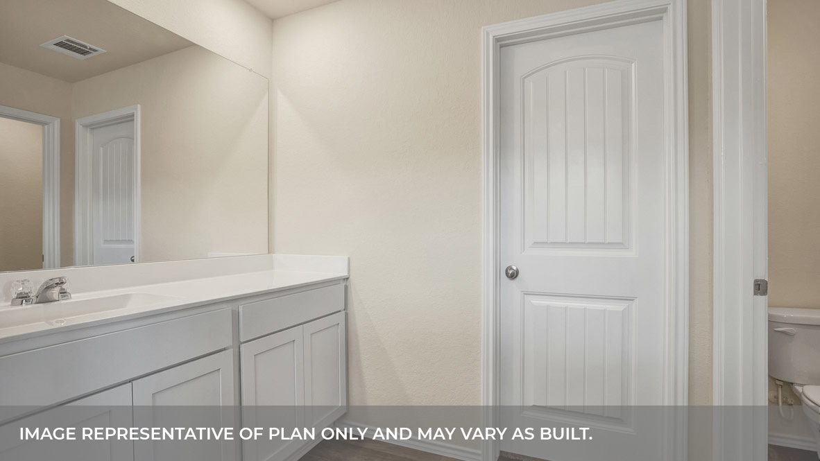 Main bathroom with large walk-in shower and vanity.