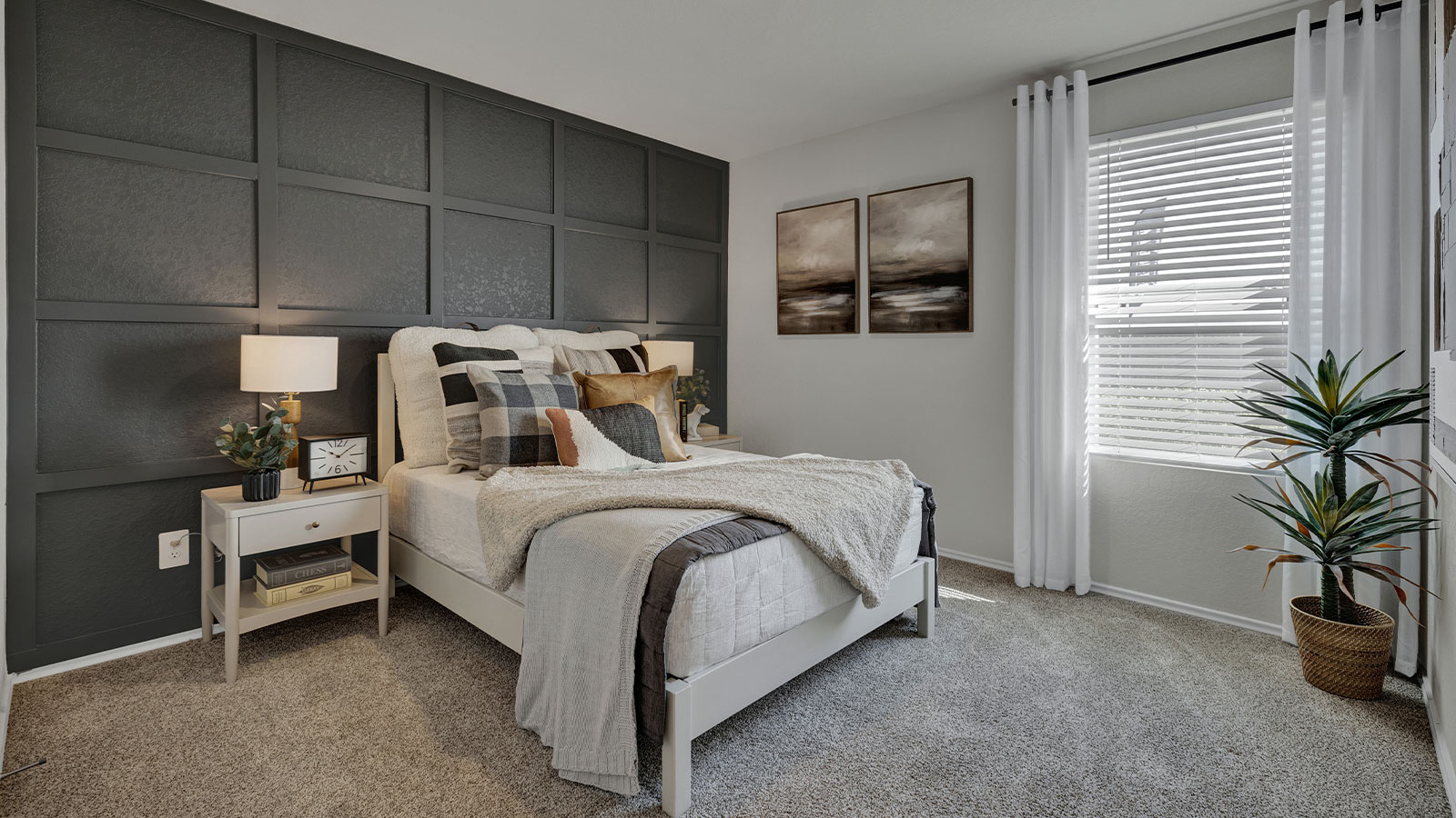 Bedroom with carpeting and one window.