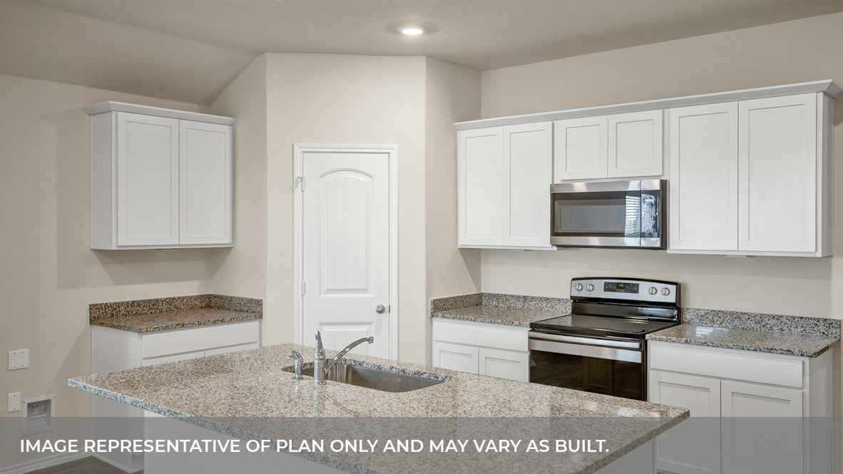 Kitchen with kitchen island and kitchen sink.