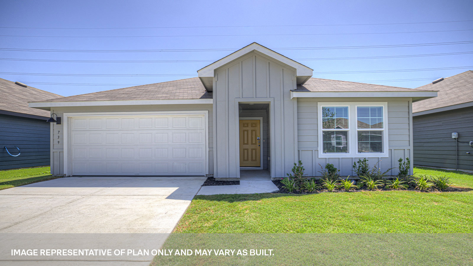 Single-story farmhouse exteriors with 2 car garage.
