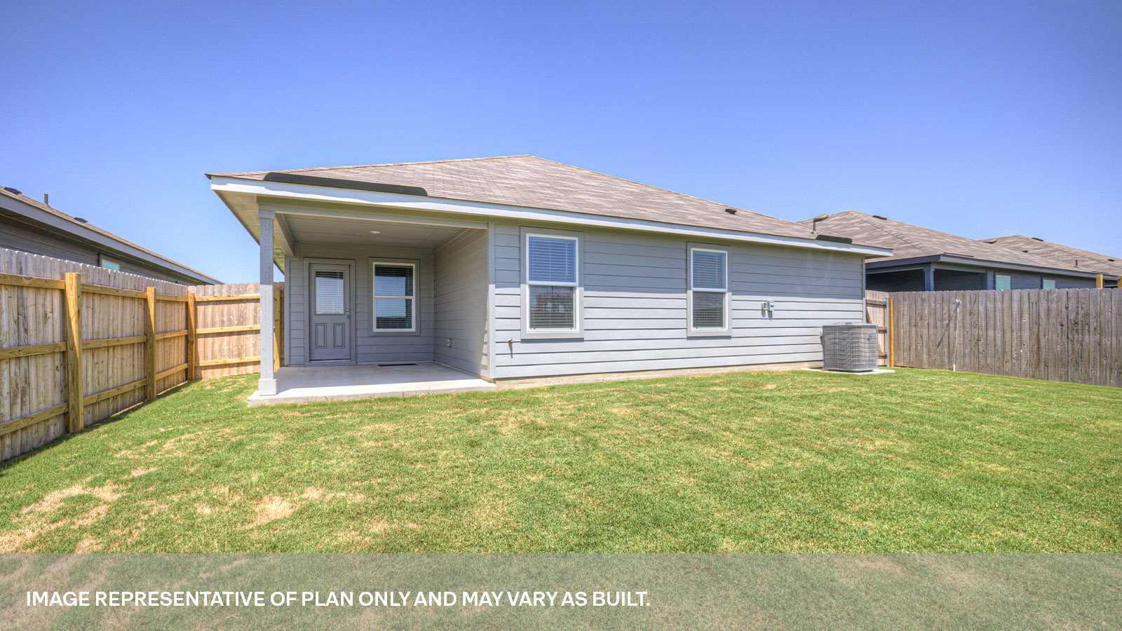 Covered patio with fully sodded backyard and privacy fence.