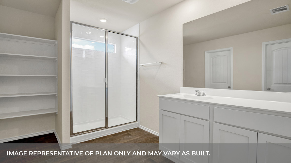 Main bathroom with vanity, walk-in shower, and wooden shelving.