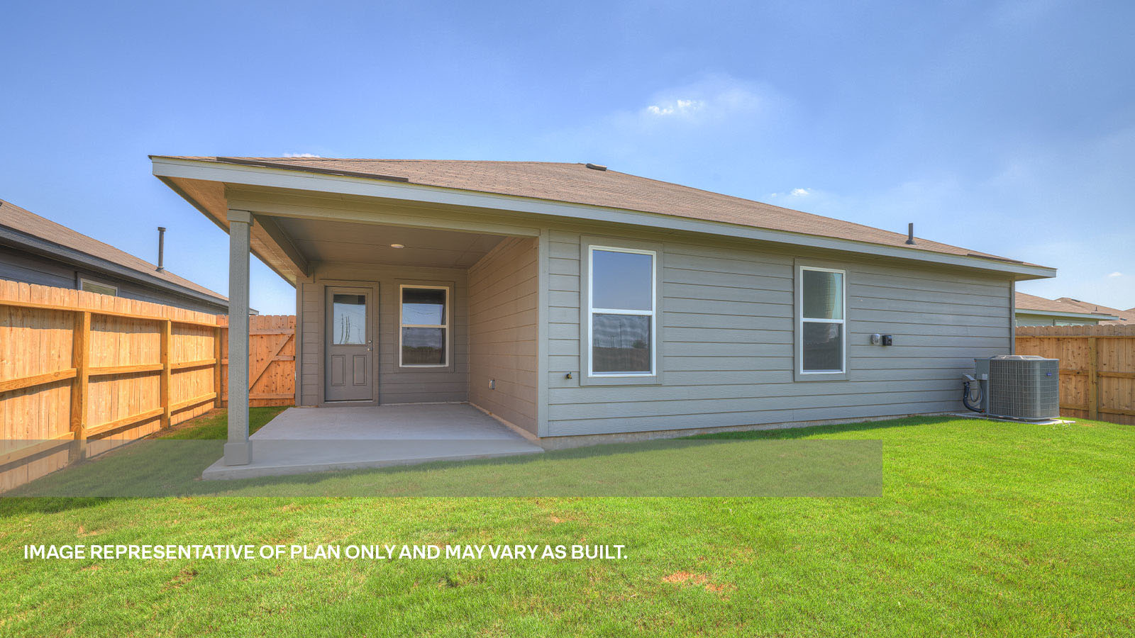 Covered patio with fully sodded backyard and privacy fence.