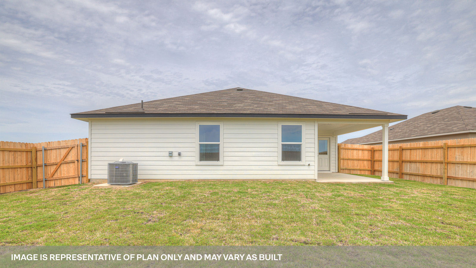 Covered patio with fully sodded backyard and privacy fence.