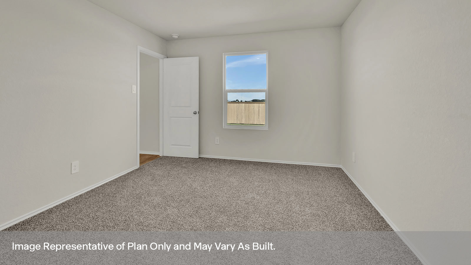 Main bedroom with carpeting and one window.