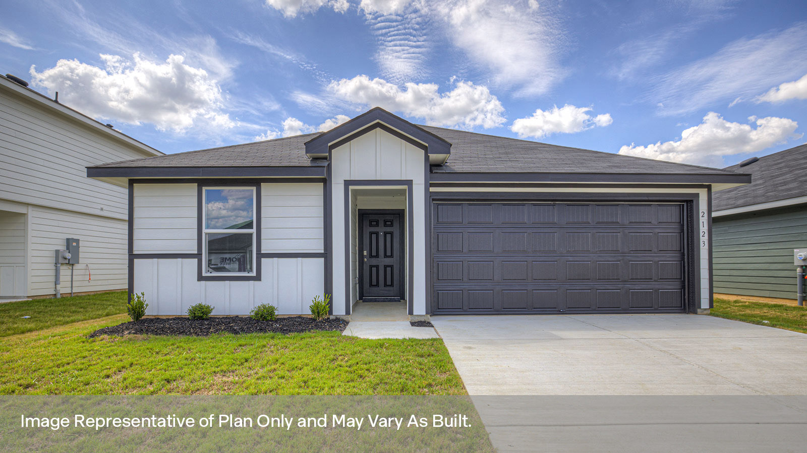 Single-story farmhouse exteriors with one window and a 2 car garage.