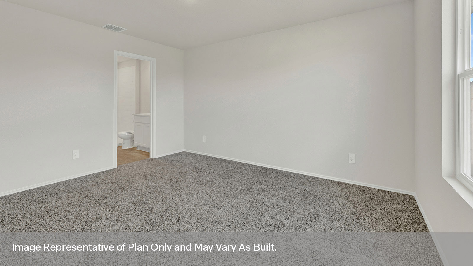 Main bedroom with carpeting and one window.