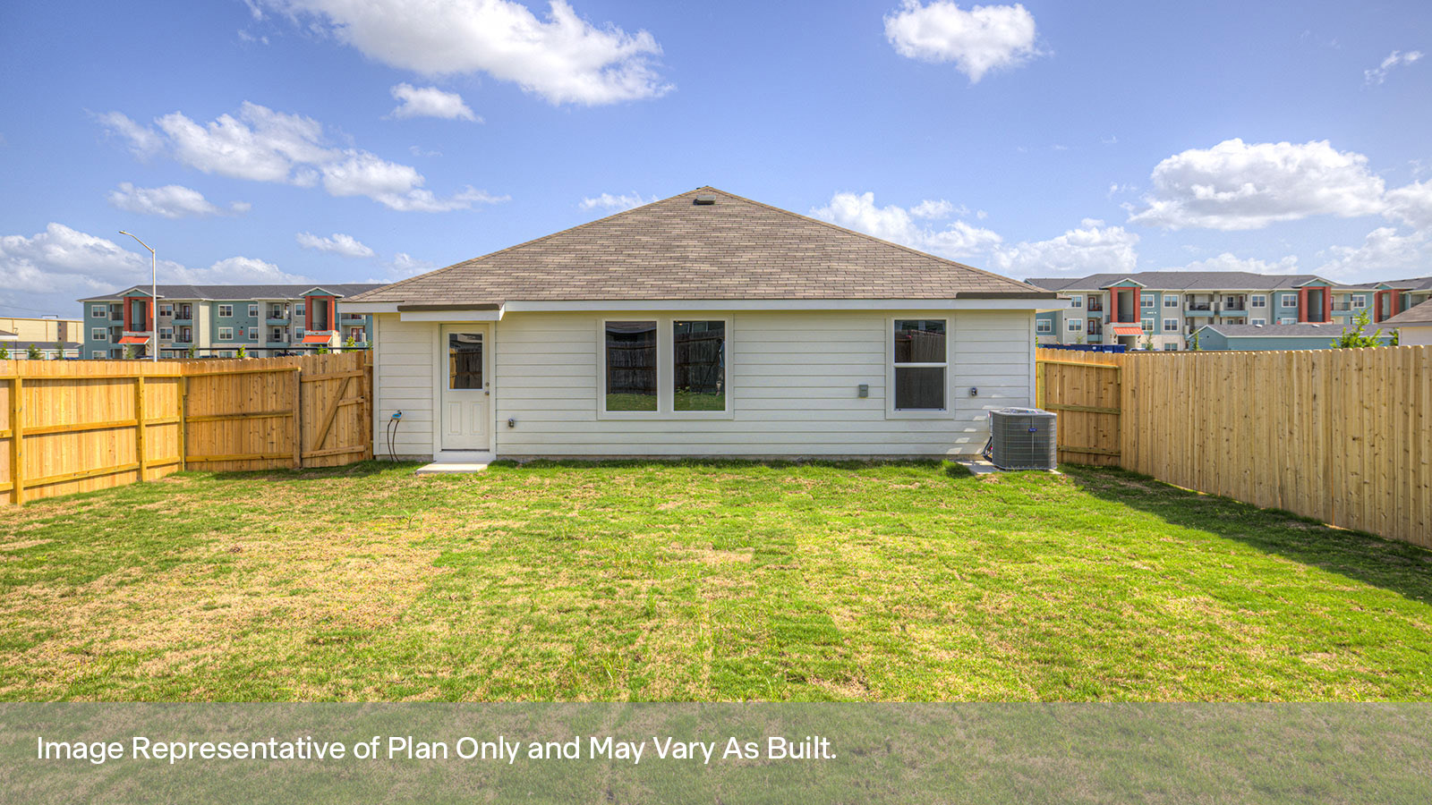 Fully sodded backyard with privacy fence.
