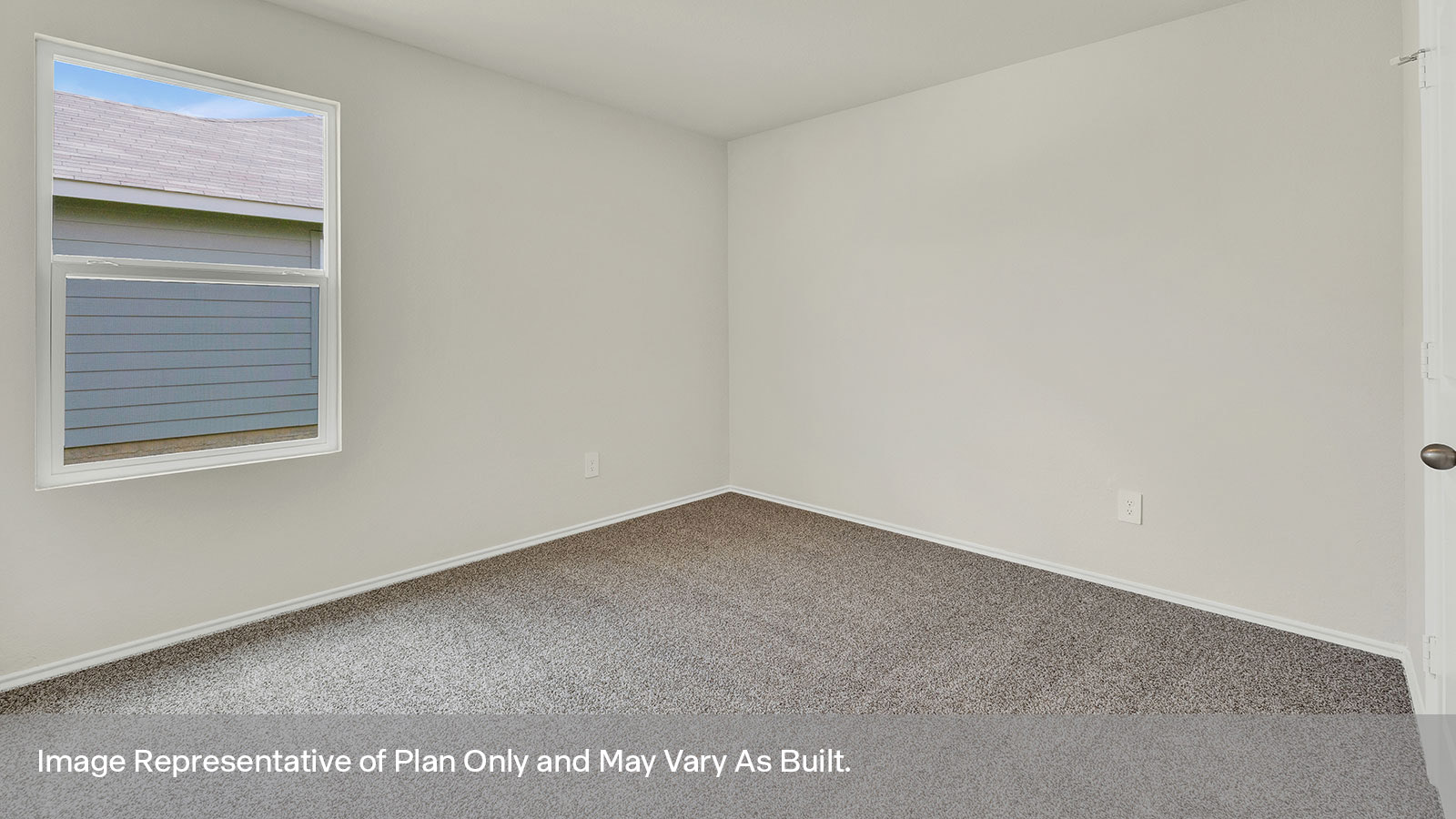 Secondary bedroom with carpeting and one window.