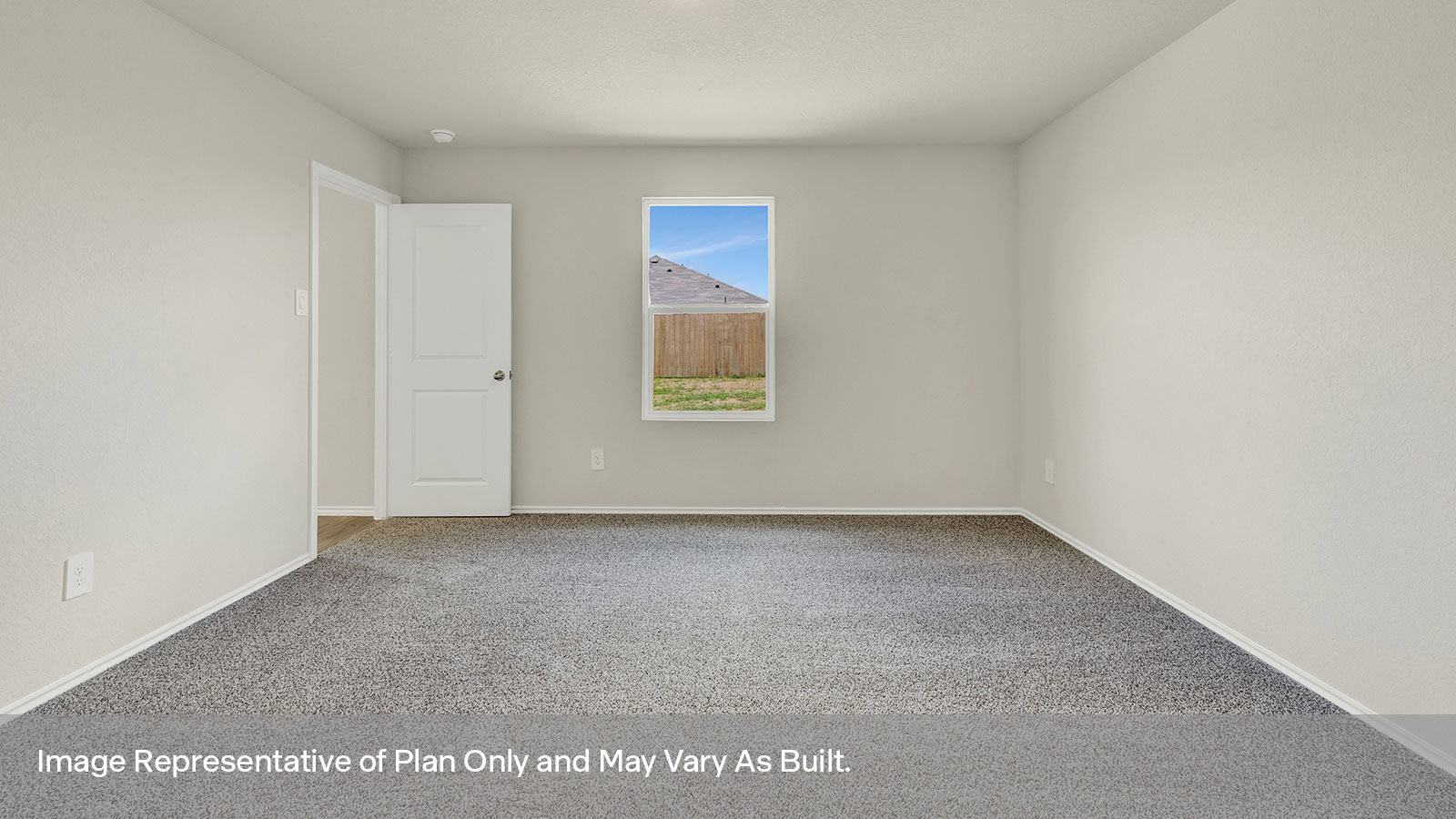 Main bedroom with carpeting and one window.