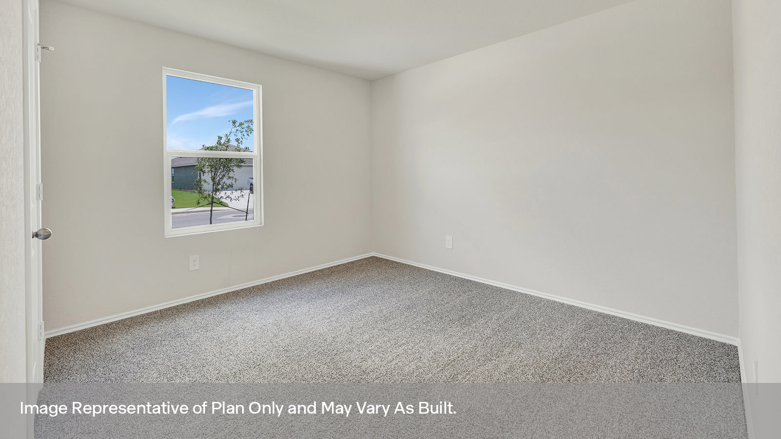 Front bedroom with carpeting and one window.