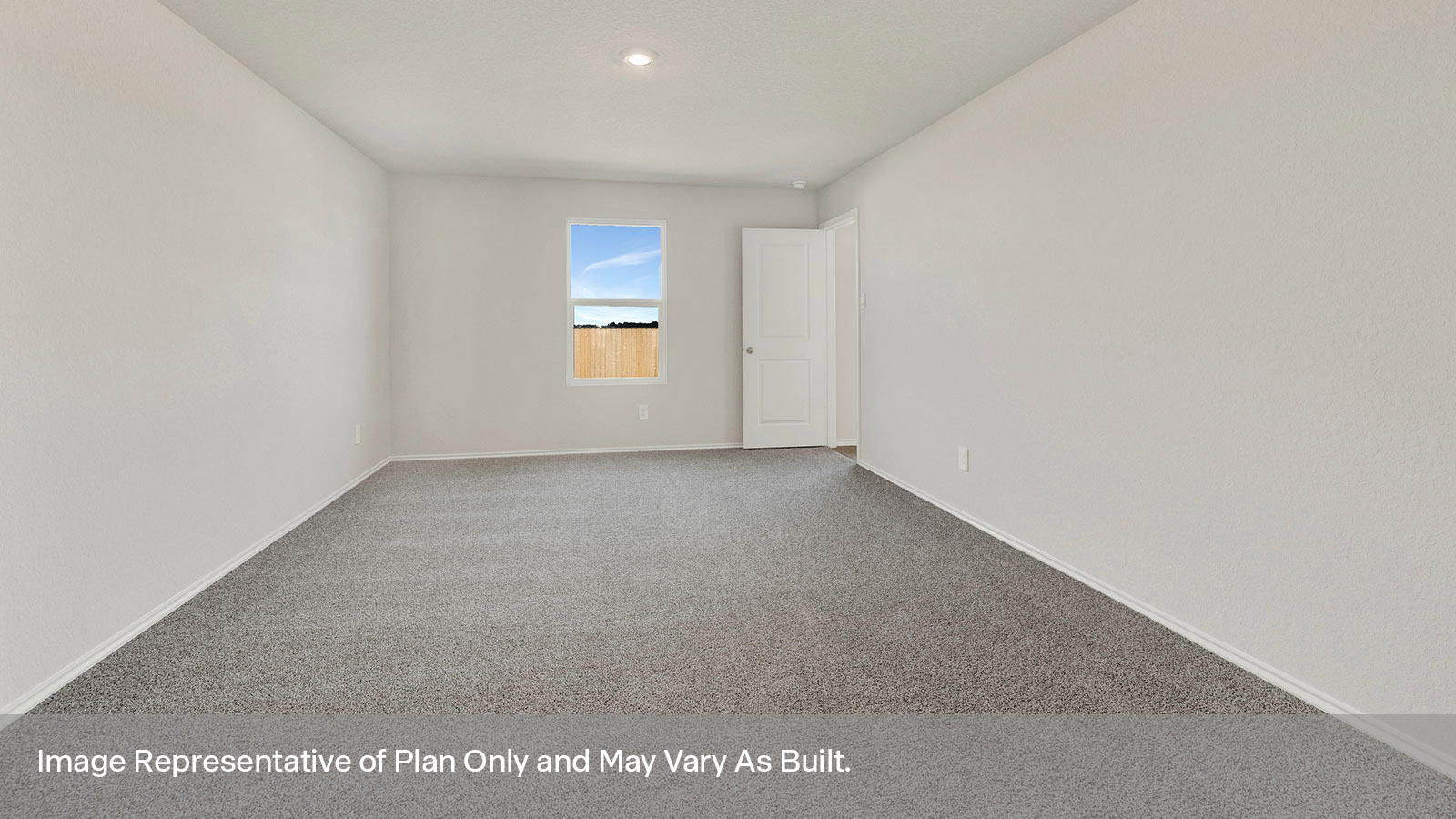 Main bedroom with carpeting and one window.