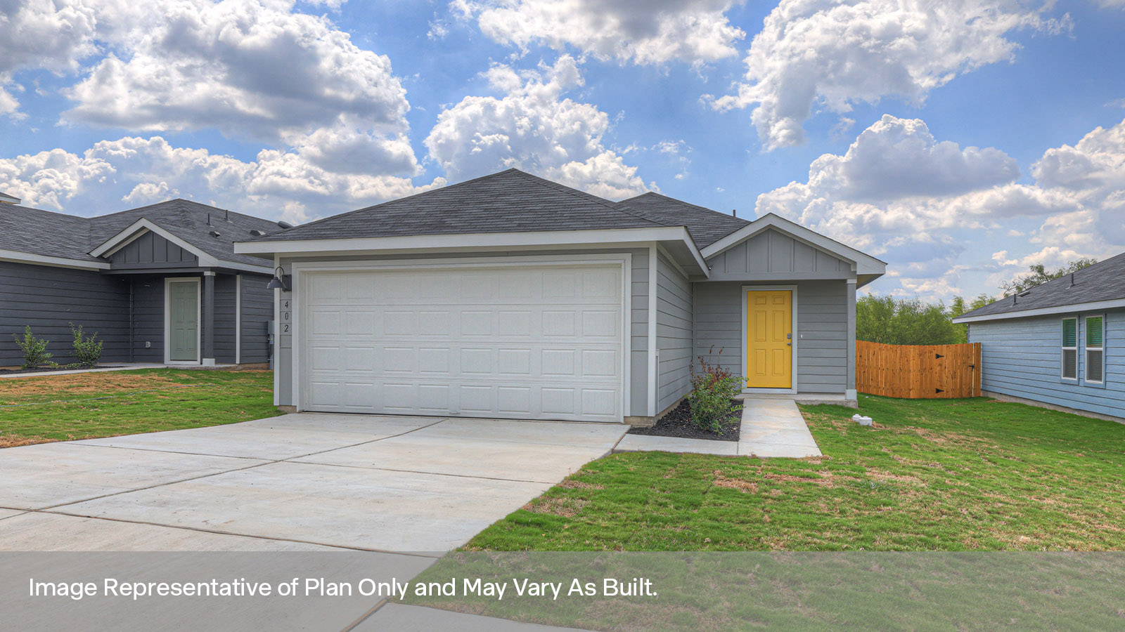 Single-story farmhouse with 2 car garage.
