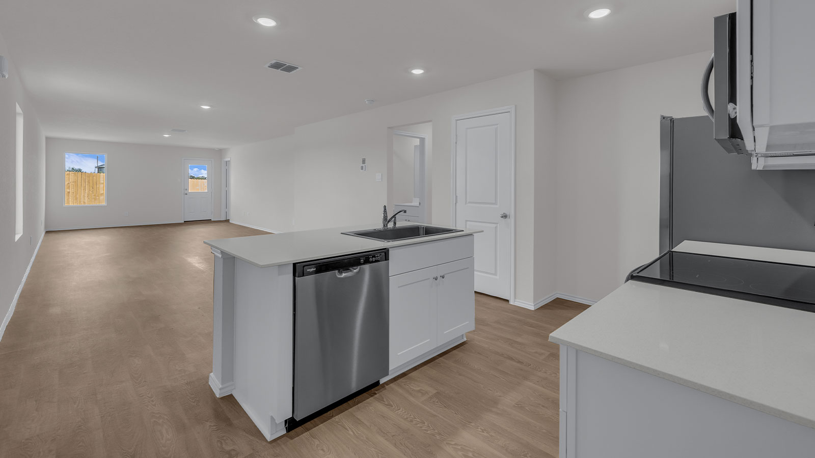 Kitchen island overlooking the dining room and living room.