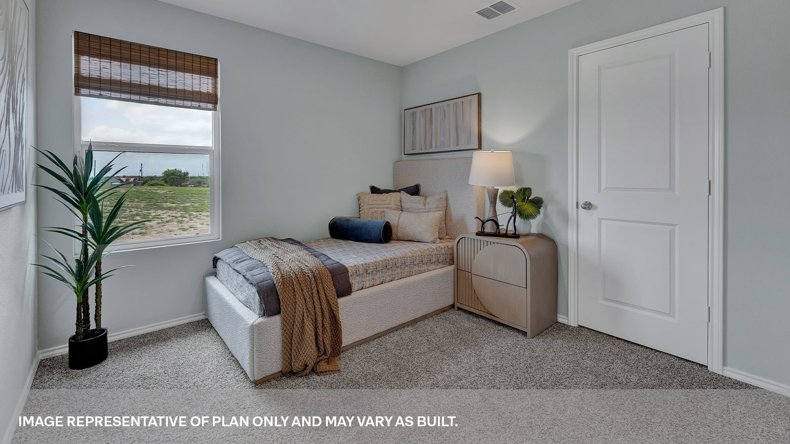 Bedroom with carpeting and one window.