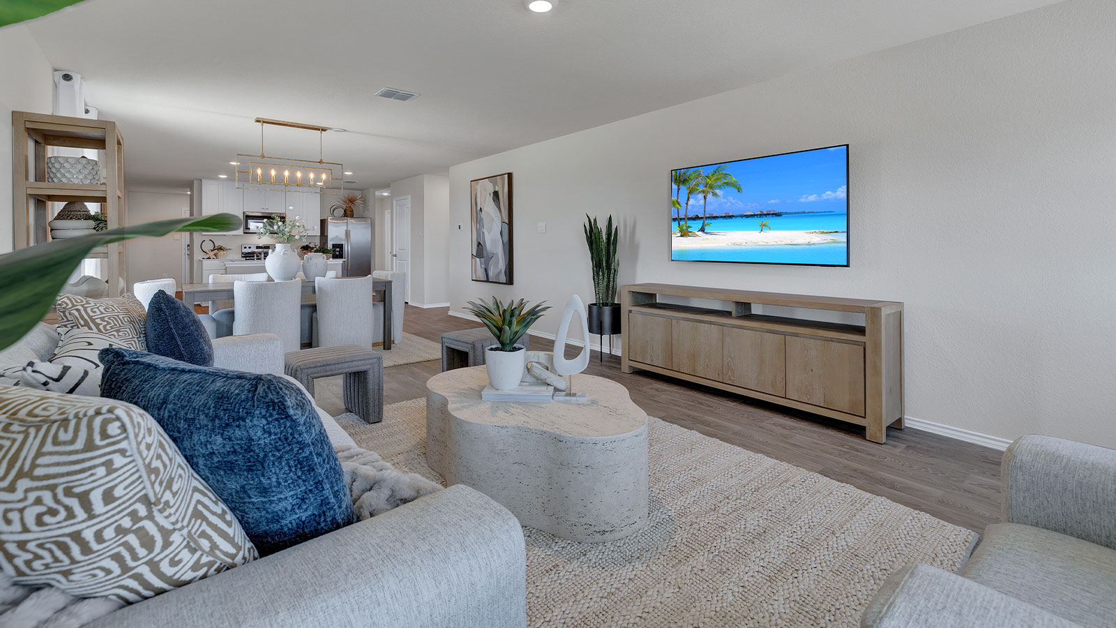 Living room with vinyl flooring and one window.