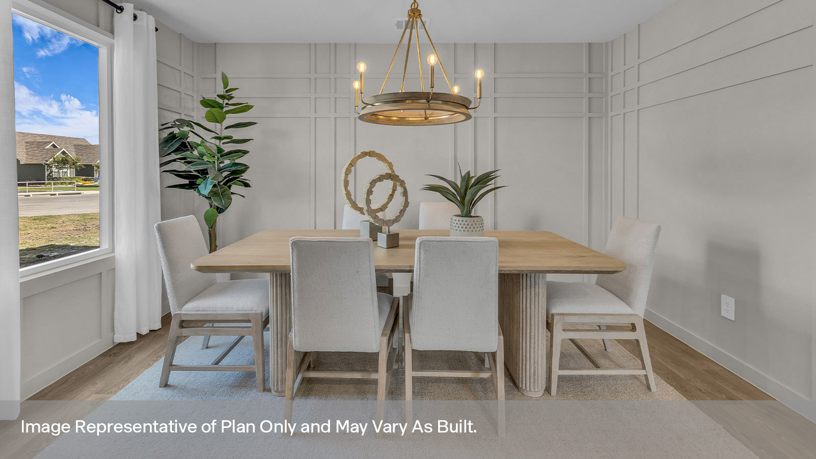 Dining room with vinyl flooring and one window.